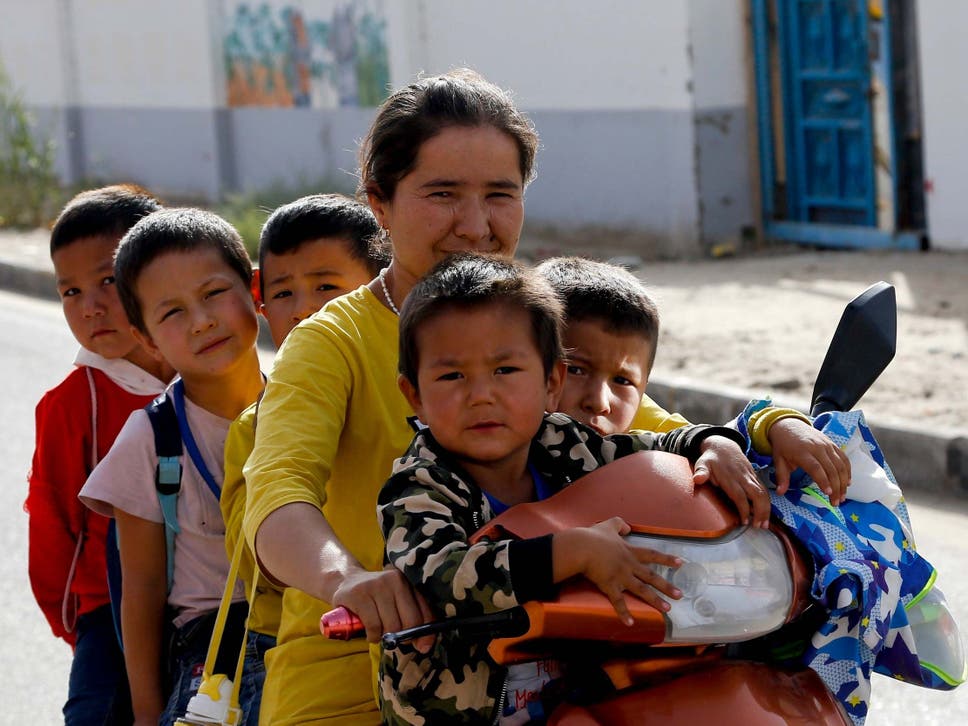 Uighur Woman and Children